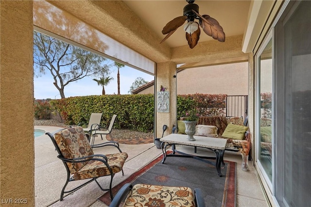 view of patio / terrace featuring ceiling fan