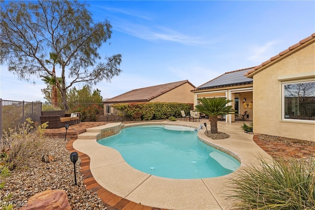 view of pool with a patio, a fenced backyard, and a fenced in pool