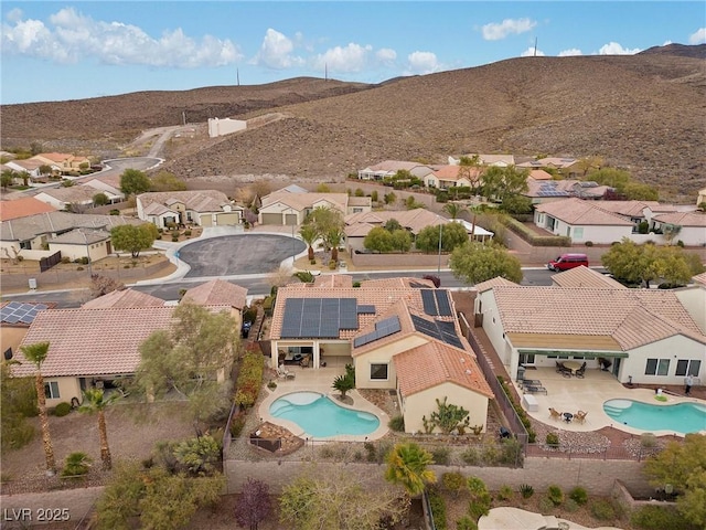 birds eye view of property featuring a residential view and a mountain view