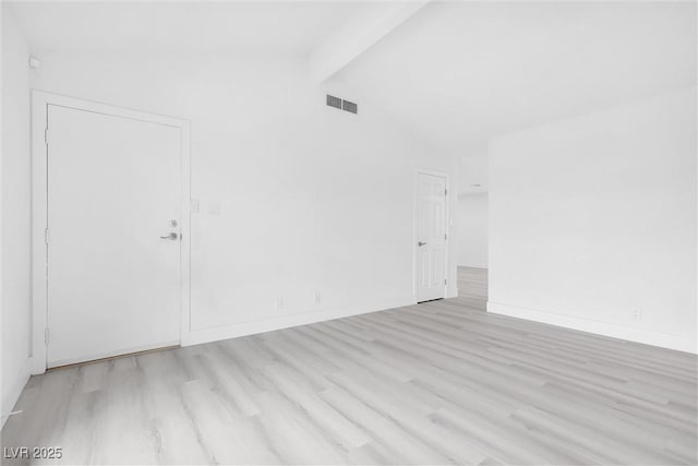 empty room featuring baseboards, visible vents, light wood finished floors, high vaulted ceiling, and beamed ceiling