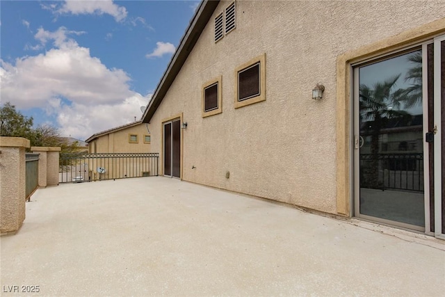 view of patio / terrace with fence