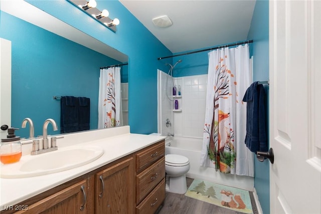 bathroom with shower / tub combo, toilet, wood finished floors, and vanity