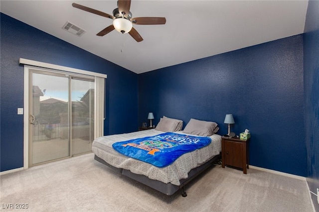 carpeted bedroom featuring access to exterior, visible vents, ceiling fan, baseboards, and vaulted ceiling