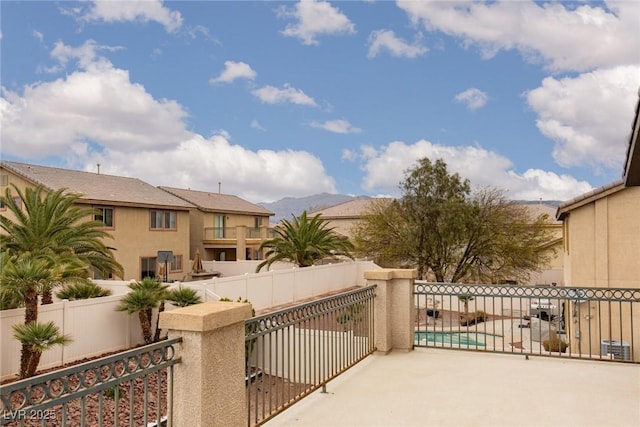 view of patio / terrace with a fenced in pool and a fenced backyard