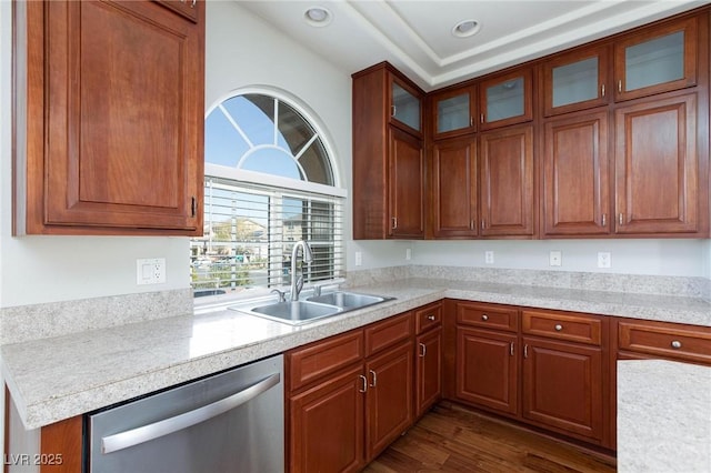 kitchen with recessed lighting, a sink, light countertops, dark wood-type flooring, and dishwasher