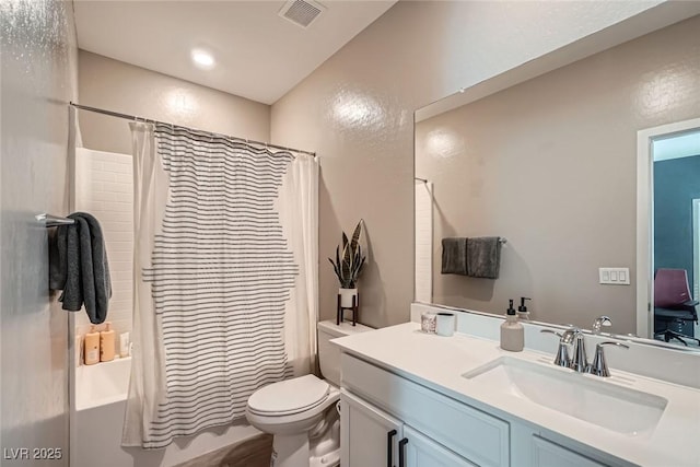 bathroom with vanity, toilet, visible vents, and shower / tub combo with curtain