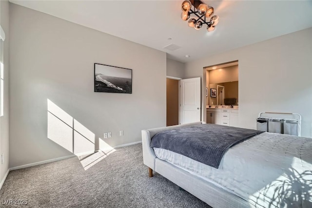 carpeted bedroom featuring baseboards