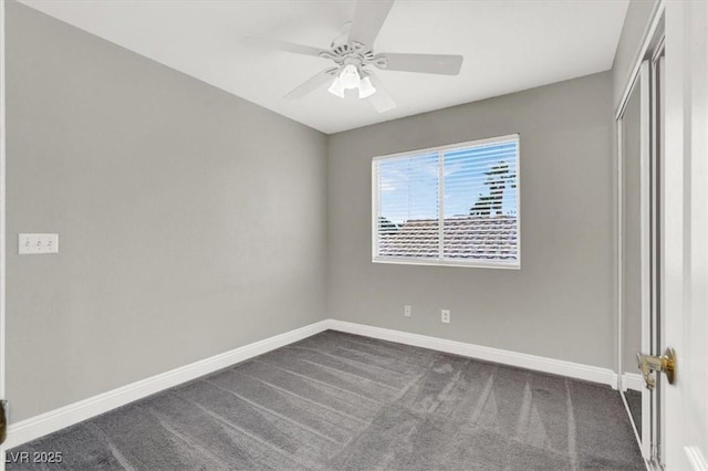 unfurnished bedroom featuring a closet, baseboards, dark carpet, and ceiling fan