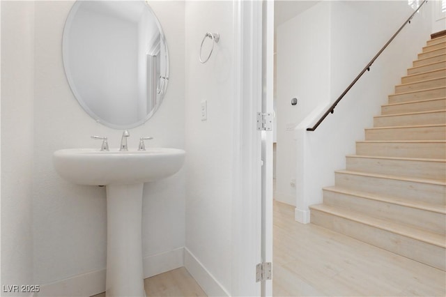 bathroom with wood finished floors