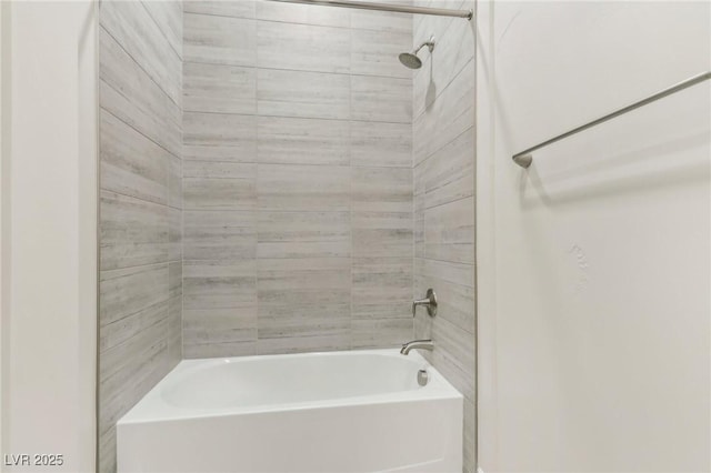 bathroom featuring washtub / shower combination