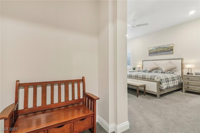 bedroom featuring recessed lighting, baseboards, and carpet