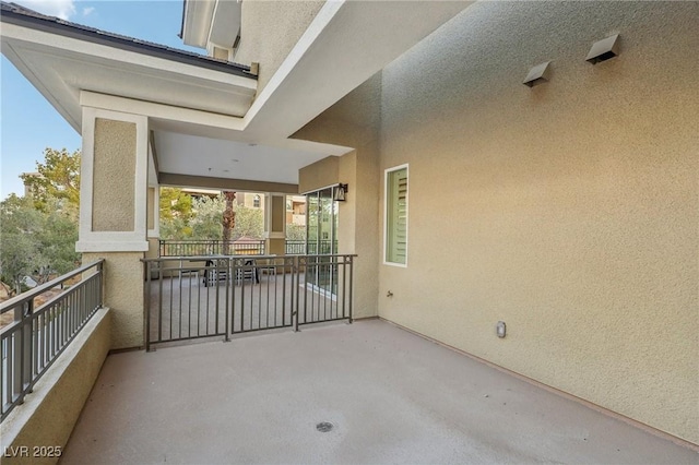 view of patio / terrace with a balcony