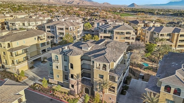 bird's eye view with a residential view and a mountain view