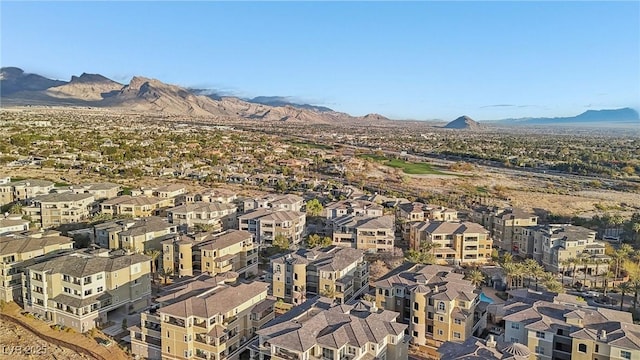 exterior space with a mountain view and a residential view