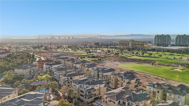 drone / aerial view featuring a view of city and view of golf course