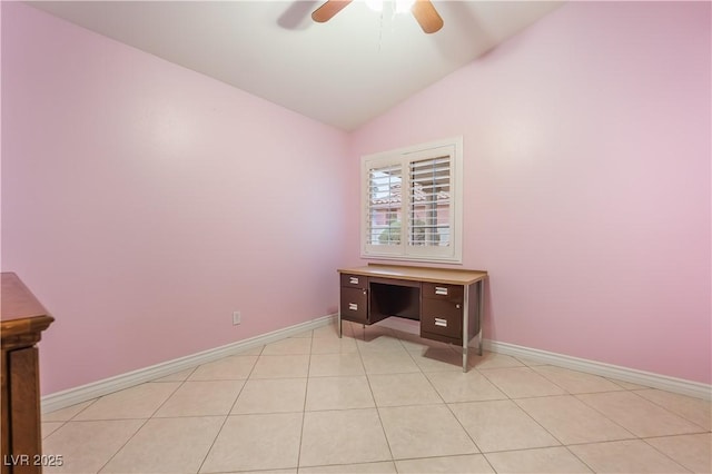 office with lofted ceiling, light tile patterned flooring, baseboards, and ceiling fan