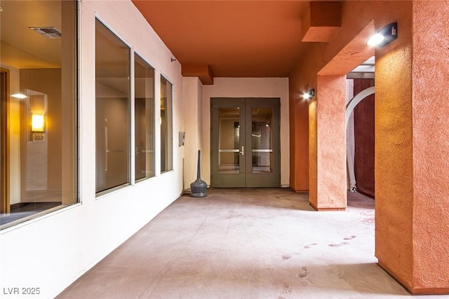 exterior space featuring visible vents and french doors