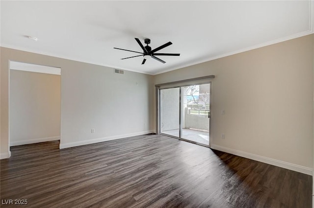 unfurnished room with dark wood finished floors, baseboards, crown molding, and ceiling fan