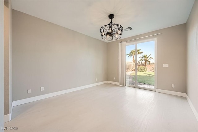 unfurnished room featuring a chandelier, visible vents, light wood finished floors, and baseboards