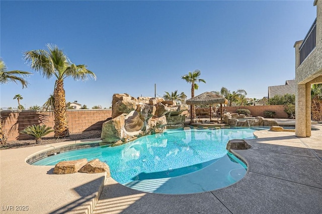 view of pool featuring a gazebo, a fenced in pool, a patio, and a fenced backyard