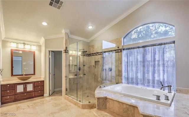 full bath featuring visible vents, a garden tub, ornamental molding, a stall shower, and vanity