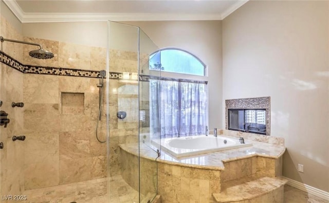 full bathroom featuring a bath, a shower stall, baseboards, and ornamental molding