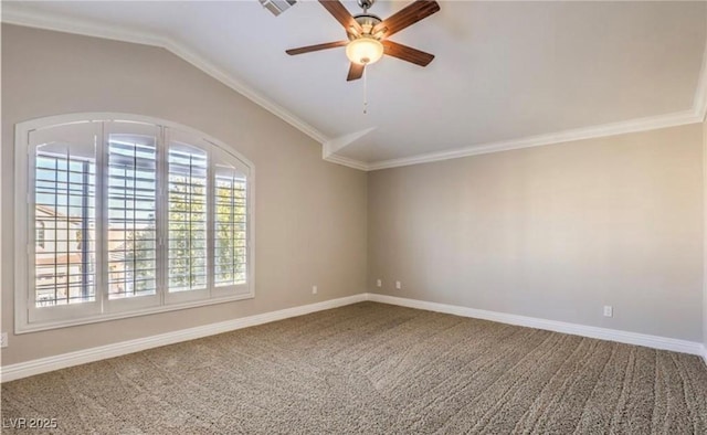 unfurnished room featuring crown molding, baseboards, ceiling fan, lofted ceiling, and carpet floors