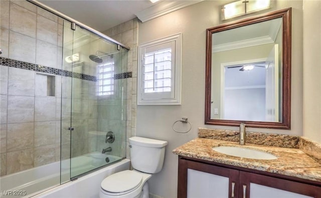 full bath featuring bath / shower combo with glass door, toilet, vanity, and ornamental molding