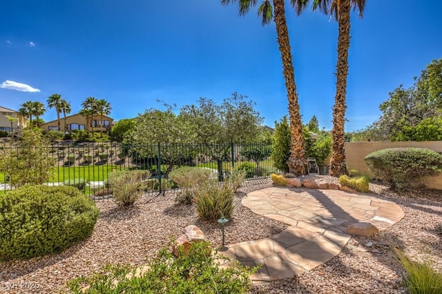 view of yard featuring a patio area and fence