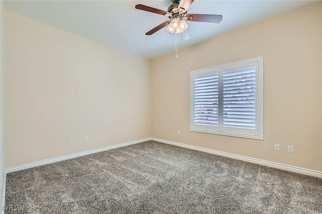 empty room with baseboards, carpet, and a ceiling fan