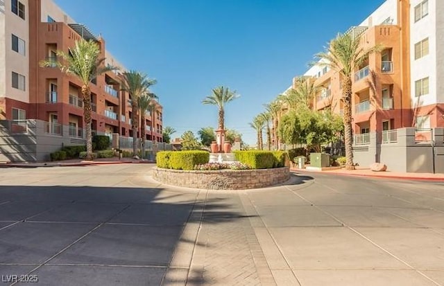 exterior space featuring curbs and sidewalks