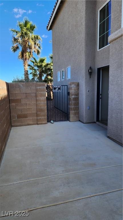 view of patio / terrace with fence