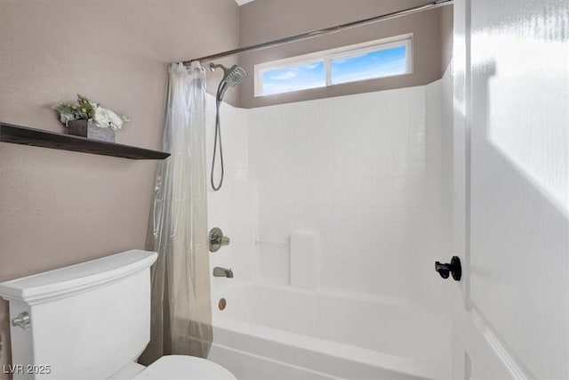 bathroom featuring toilet and shower / bathtub combination with curtain