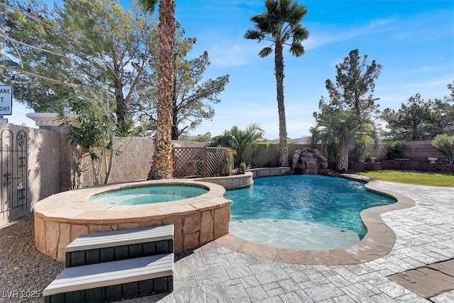 view of swimming pool with a fenced in pool, a patio, an in ground hot tub, and a fenced backyard