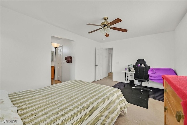 bedroom with ceiling fan and carpet floors