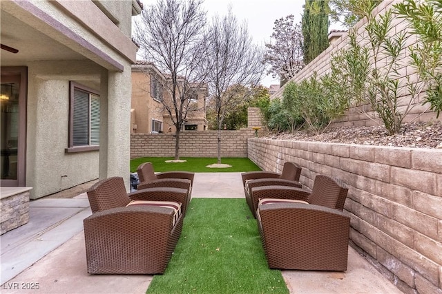 view of patio / terrace with an outdoor hangout area and a fenced backyard