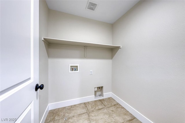 laundry area with laundry area, baseboards, visible vents, and washer hookup