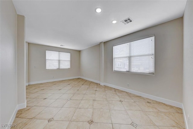 spare room with recessed lighting, visible vents, baseboards, and light tile patterned floors