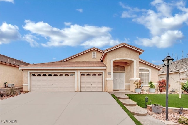 ranch-style house with stucco siding, concrete driveway, a garage, and a front yard