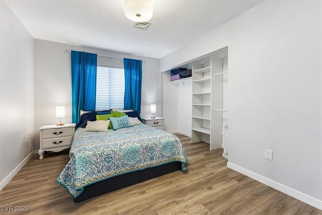 8433 Honeywood Cir, Las Vegas, NV 89128 - bedroom featuring wood finished floors and baseboards