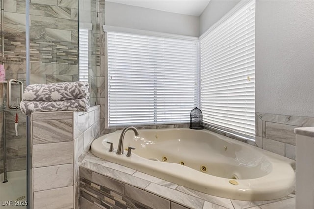 8433 Honeywood Cir, Las Vegas, NV 89128 - full bathroom featuring a shower stall and a jetted tub