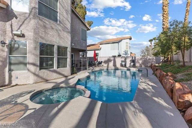 8433 Honeywood Cir, Las Vegas, NV 89128 - view of pool with a patio, a fenced backyard, and a pool with connected hot tub