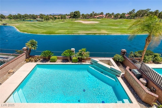 view of pool with a yard, a fenced in pool, a water view, and a fenced backyard