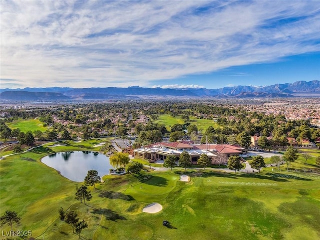 aerial view featuring a water and mountain view