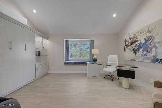 office featuring lofted ceiling, recessed lighting, baseboards, and light wood finished floors