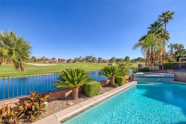 view of swimming pool with a fenced in pool, a water view, an in ground hot tub, and a fenced backyard