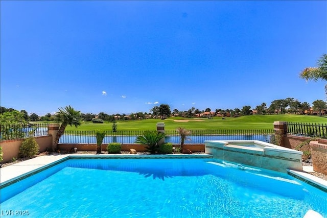 view of swimming pool featuring a fenced in pool, an in ground hot tub, a fenced backyard, and golf course view