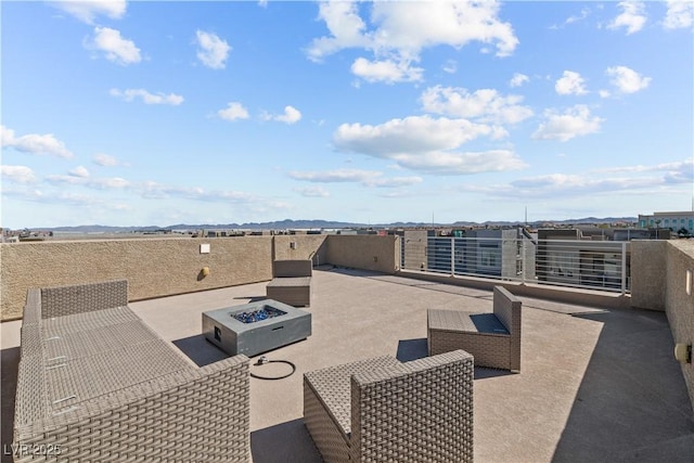 view of patio featuring a fire pit