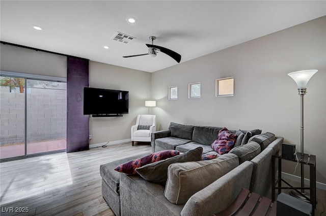 living area with visible vents, wood finished floors, recessed lighting, baseboards, and ceiling fan