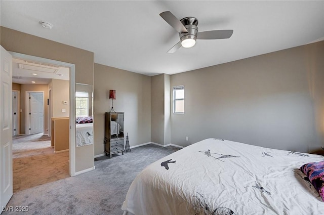 carpeted bedroom featuring baseboards and ceiling fan